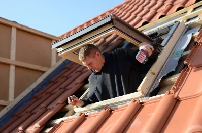 Pose de fenêtres de toit Velux à Amathay-Vésigneux